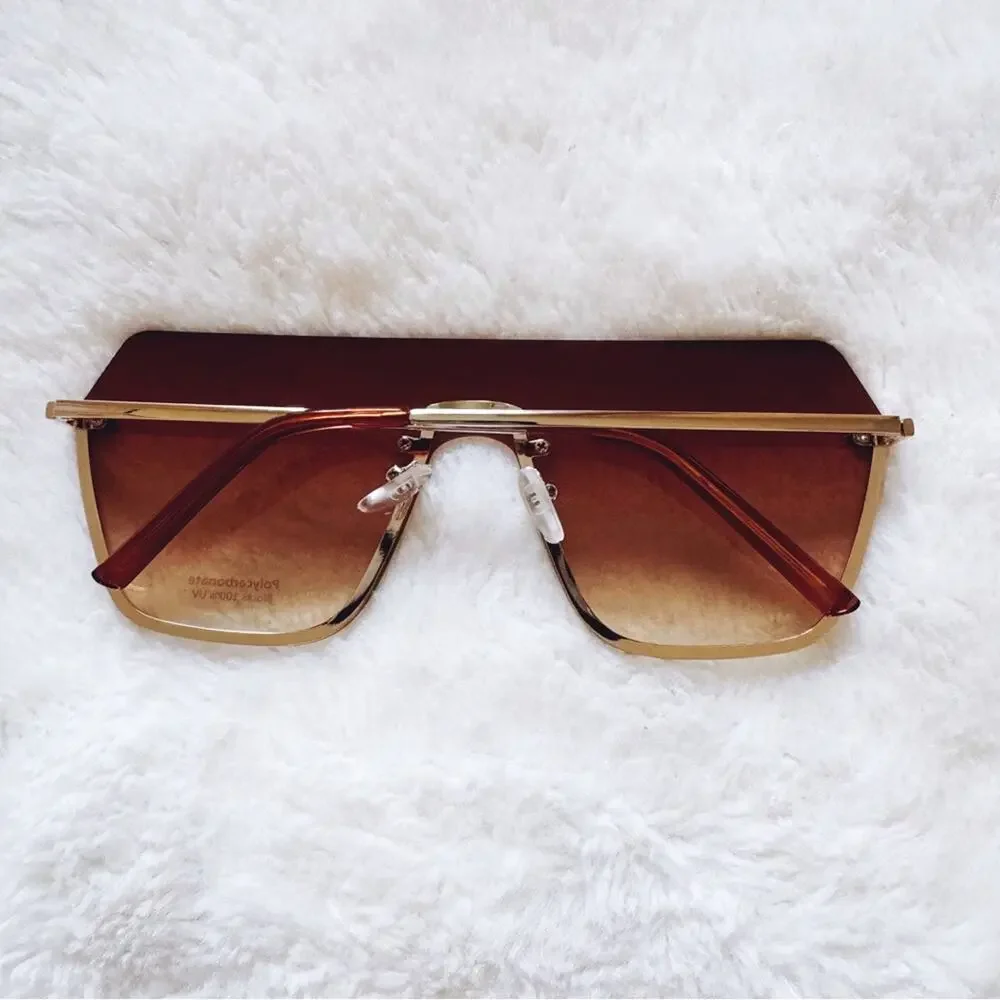 Kalia Clear Brown Rimless Sleek Sunglasses